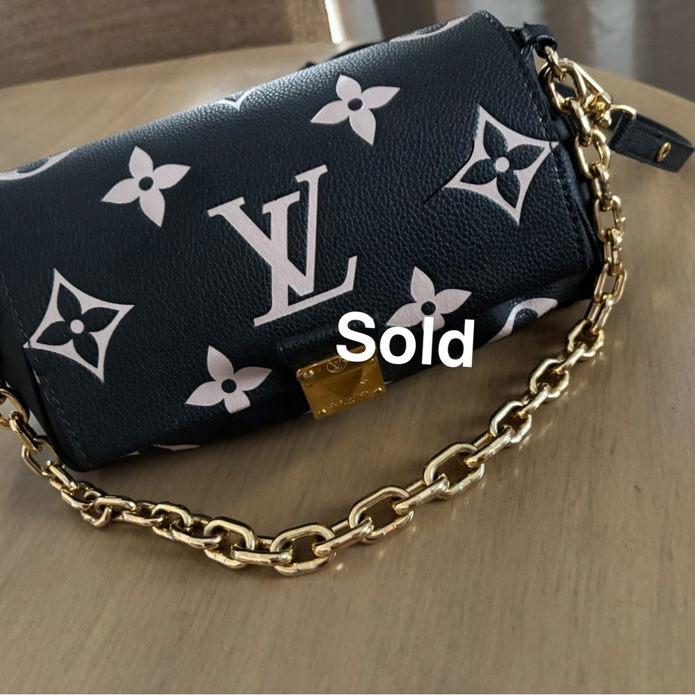 Louis Vuitton Black and Gold Clutch